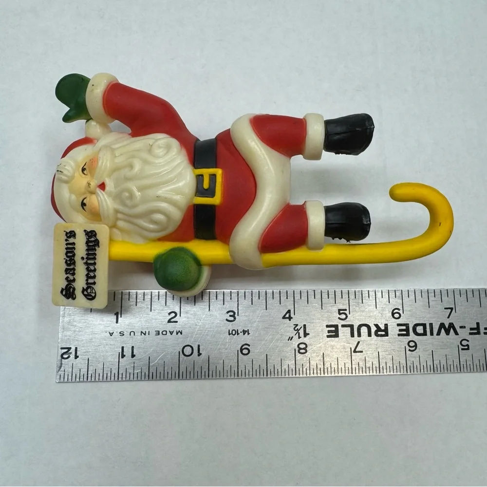 Vintage Santa Clause Stocking Hanger Hard Plastic Season’s Greetings Christmas